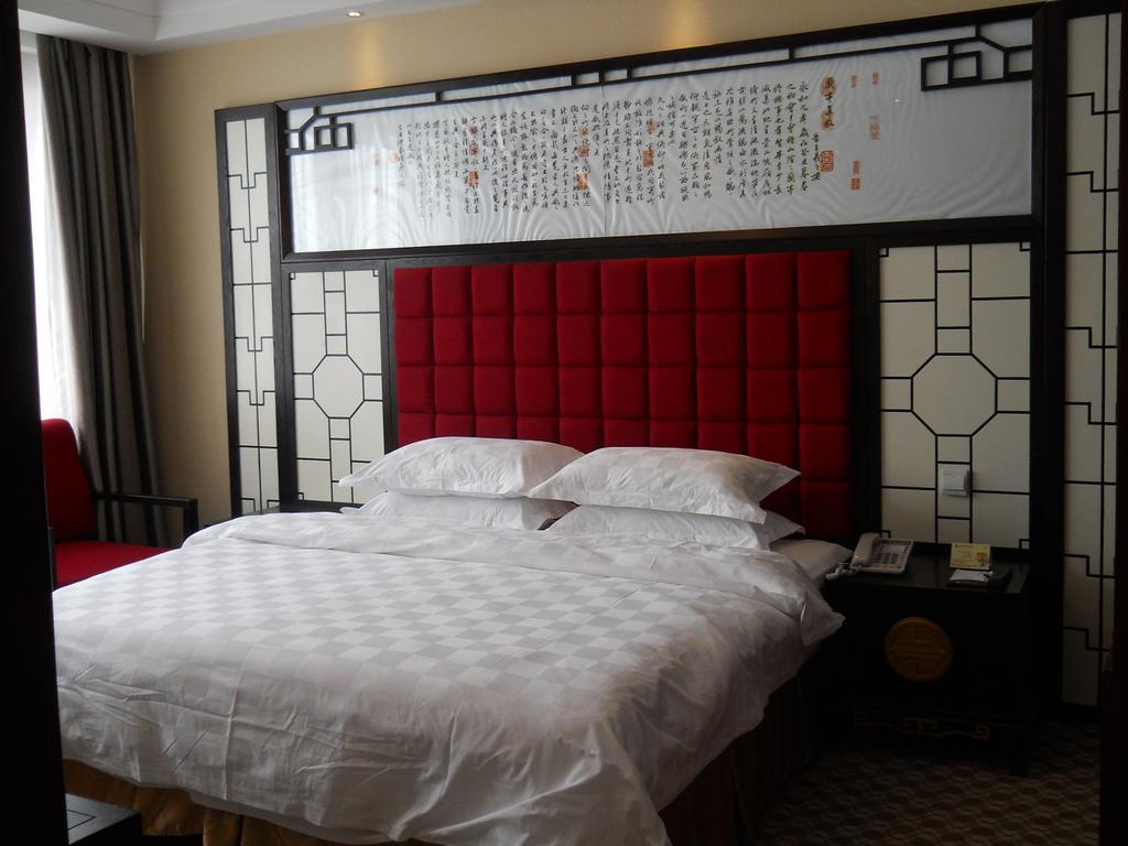 Yijing Holiday Hotel Yimeng Road Linyi  Стая снимка